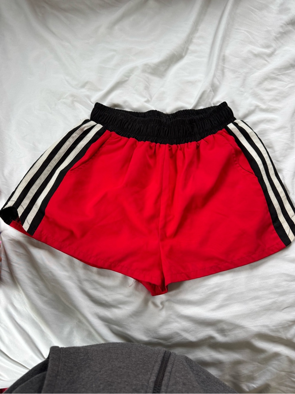 AKIRA Red Athletic Shorts with Black Waistband and White Side Stripes